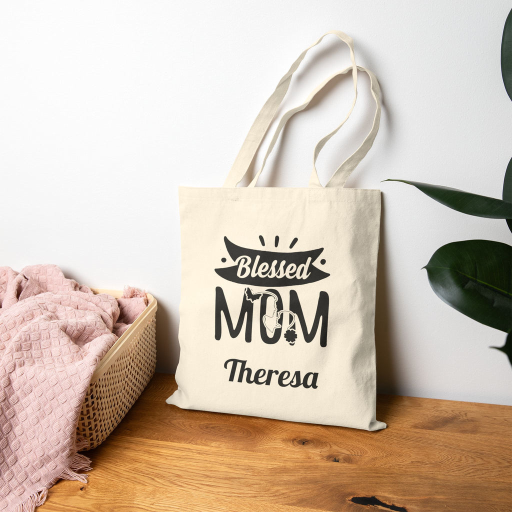 Natural canvas Blessed Mom tote bag in a home setting