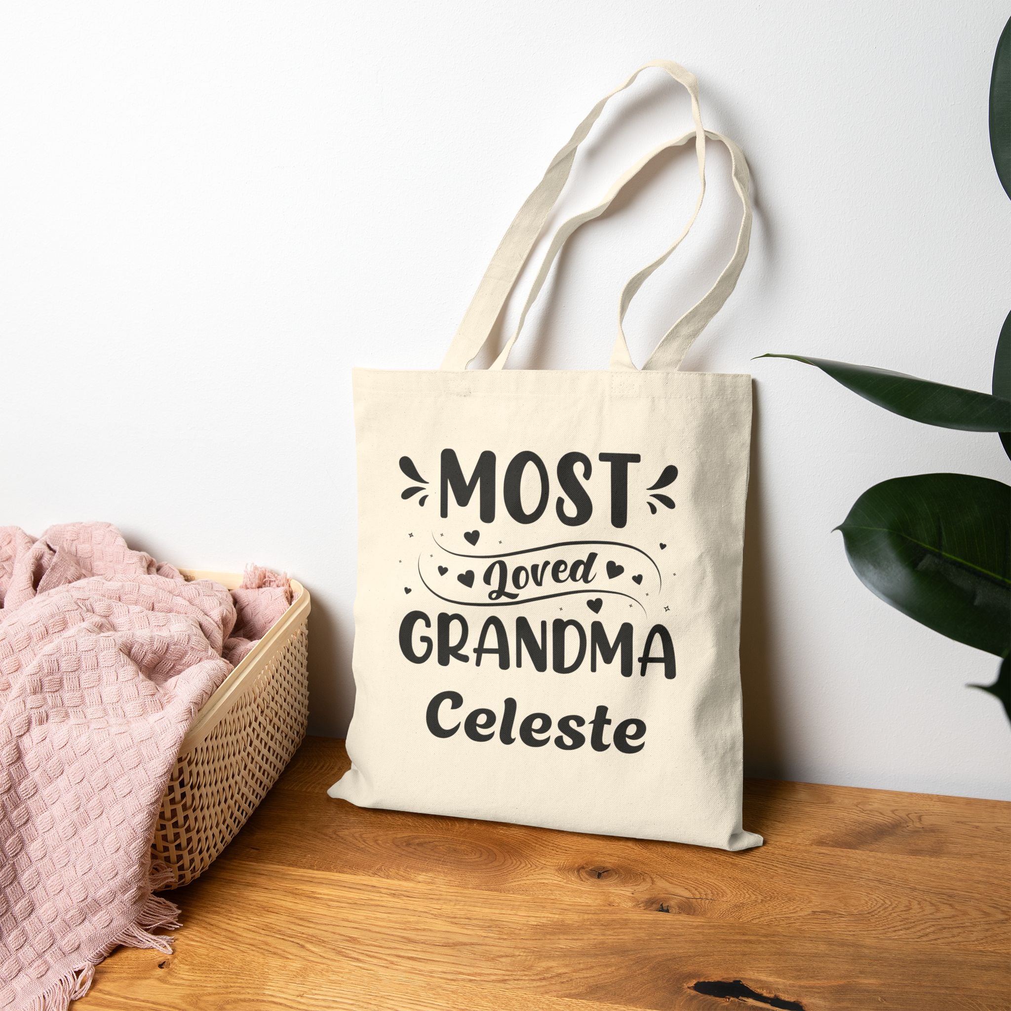 Natural canvas Most Loved Grandma tote bag in a home setting