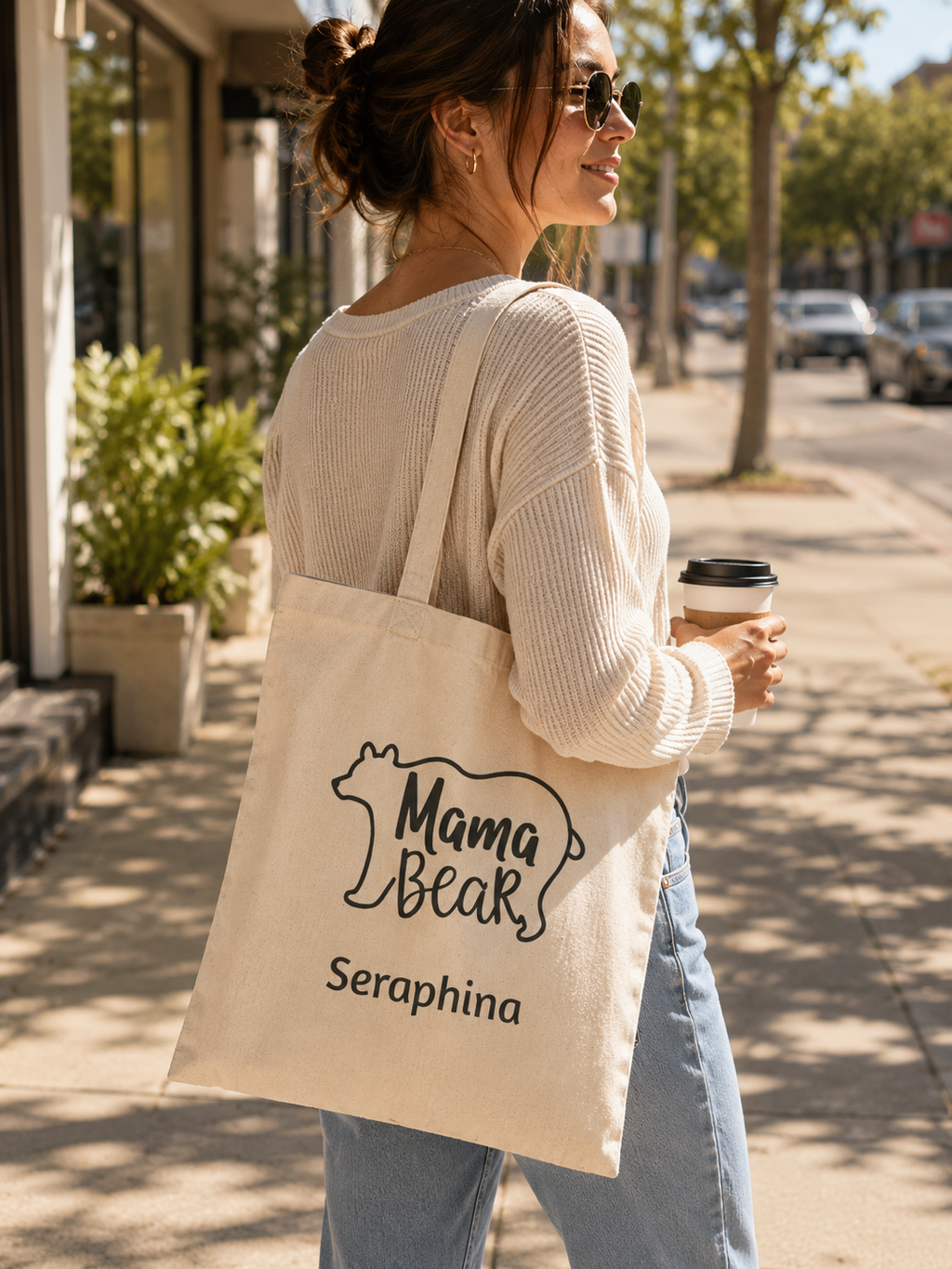 Mama Bear personalized tote bag shown held over the shoulder