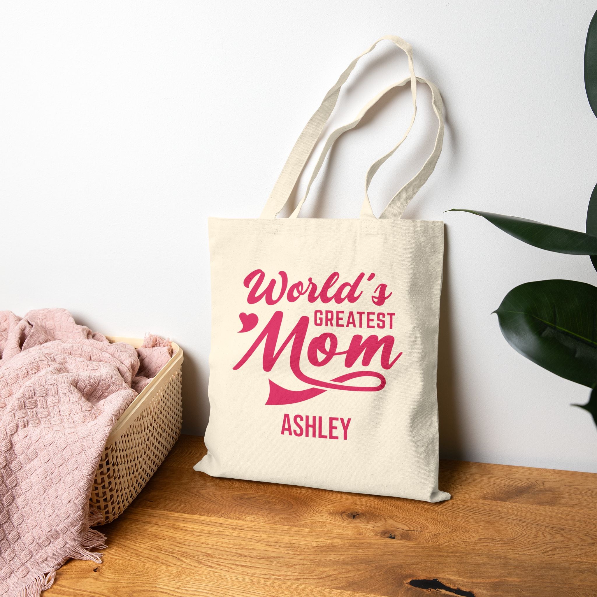 Natural canvas World's Greatest Mom tote bag in a home setting